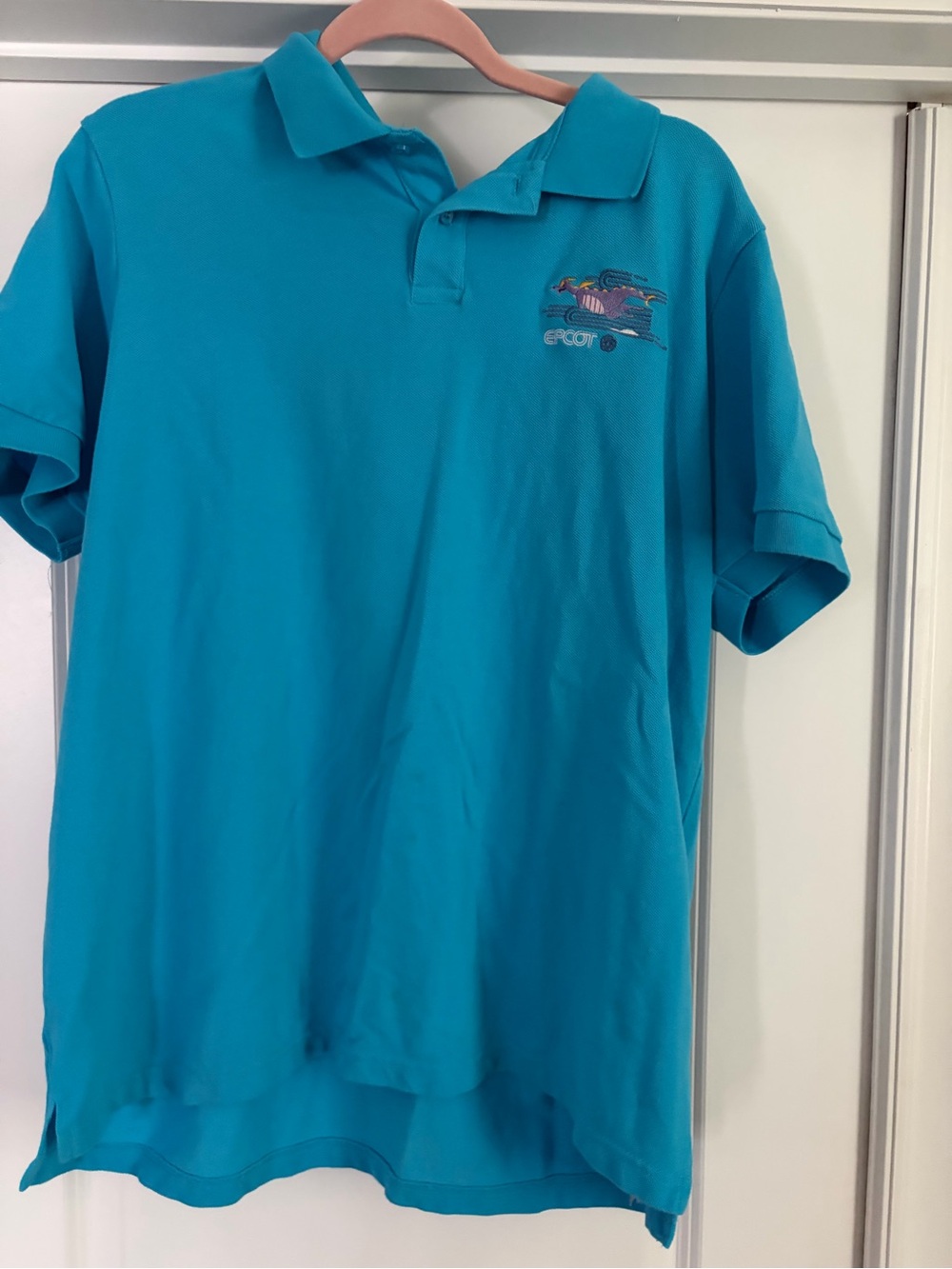 Disney Teal Figment EPCOT Polo Shirt.